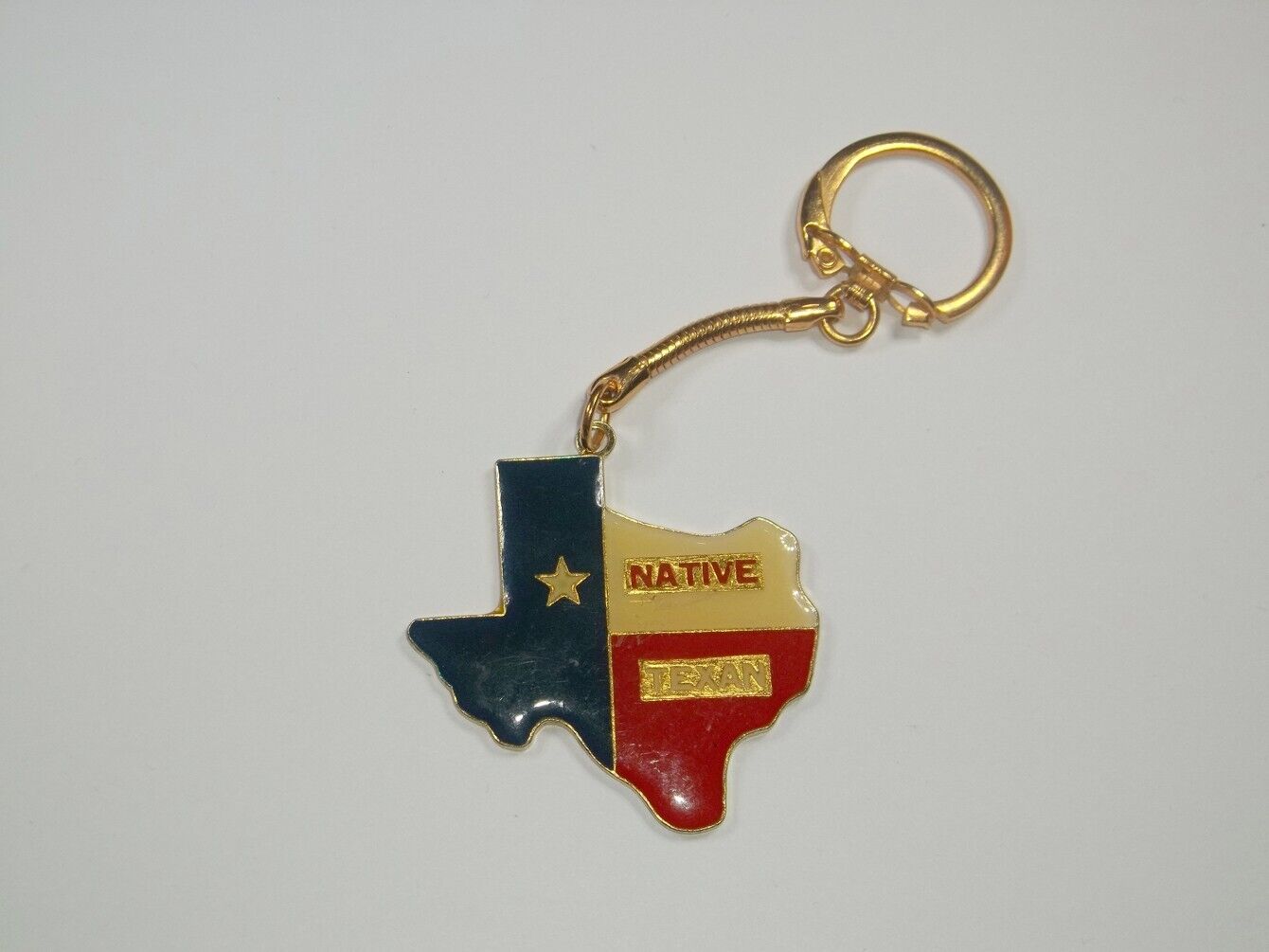 Vintage gold tone Native Texas keychain