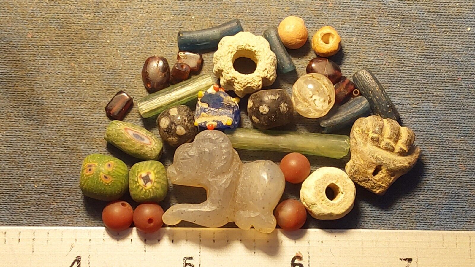25+ Ancient beads circa 1000 BC- 1700 AD + An Egyptian lapis   zoomorphic amulet