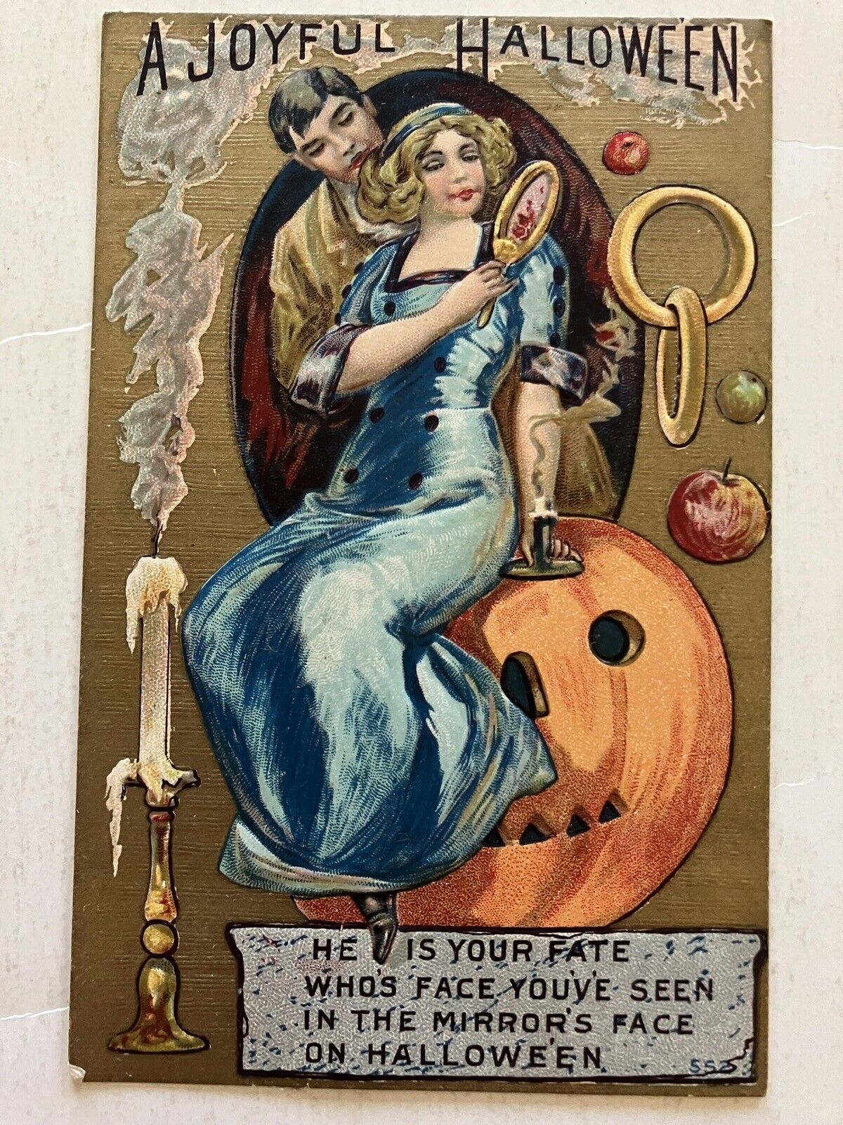 EARLY 1900’S UNKNOWN PUBL. HALLOWEEN POSTCARD  GOLD BACKGROUND MIRROR FATE