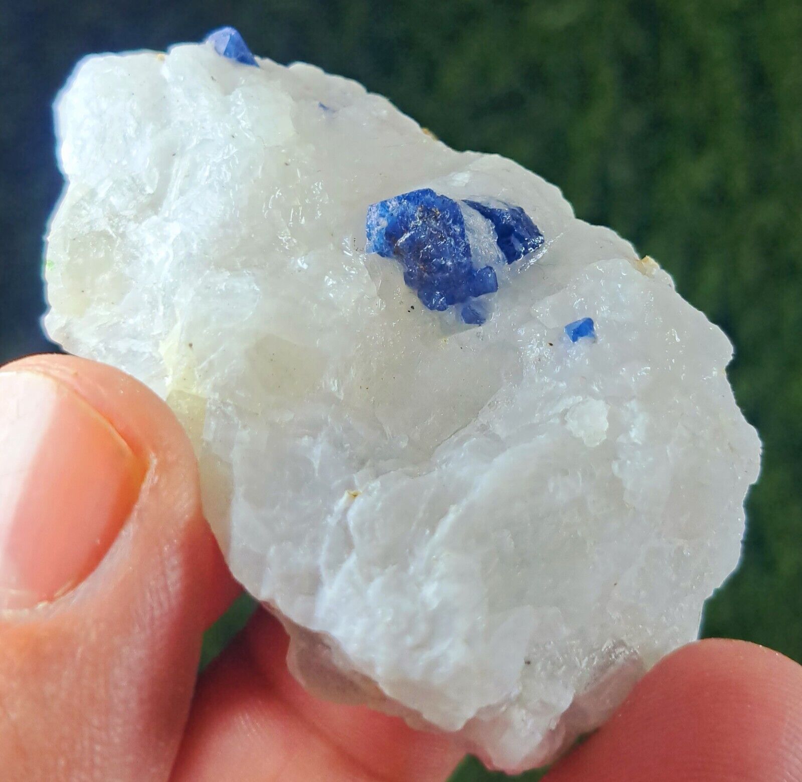 325 carats A stunning piece of lustrous blue spinel specimen on white martix