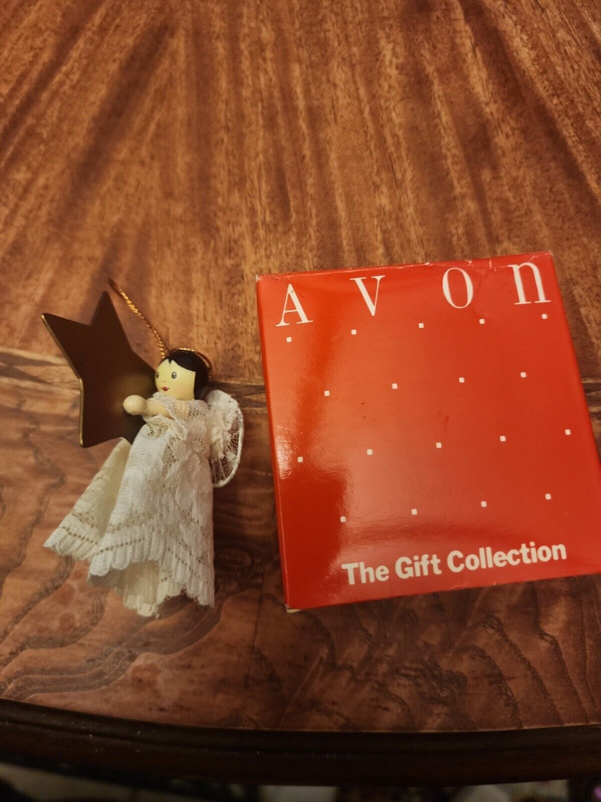 Vintage Avon Heavenly Angel Ornament with a star in a box The gift collection