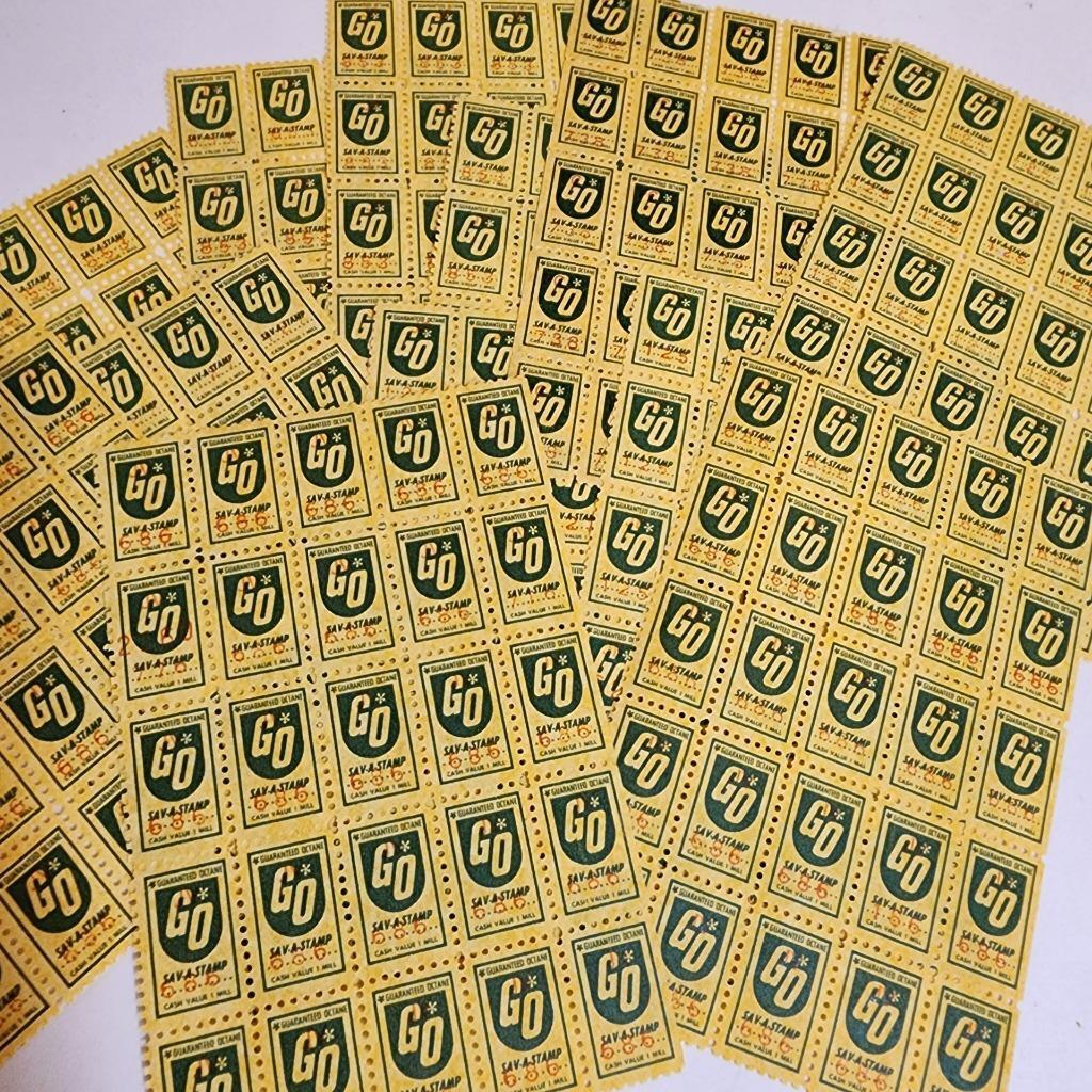 300 savings stamps 12 sheets of 25 GO green trading stamps paper ephemera