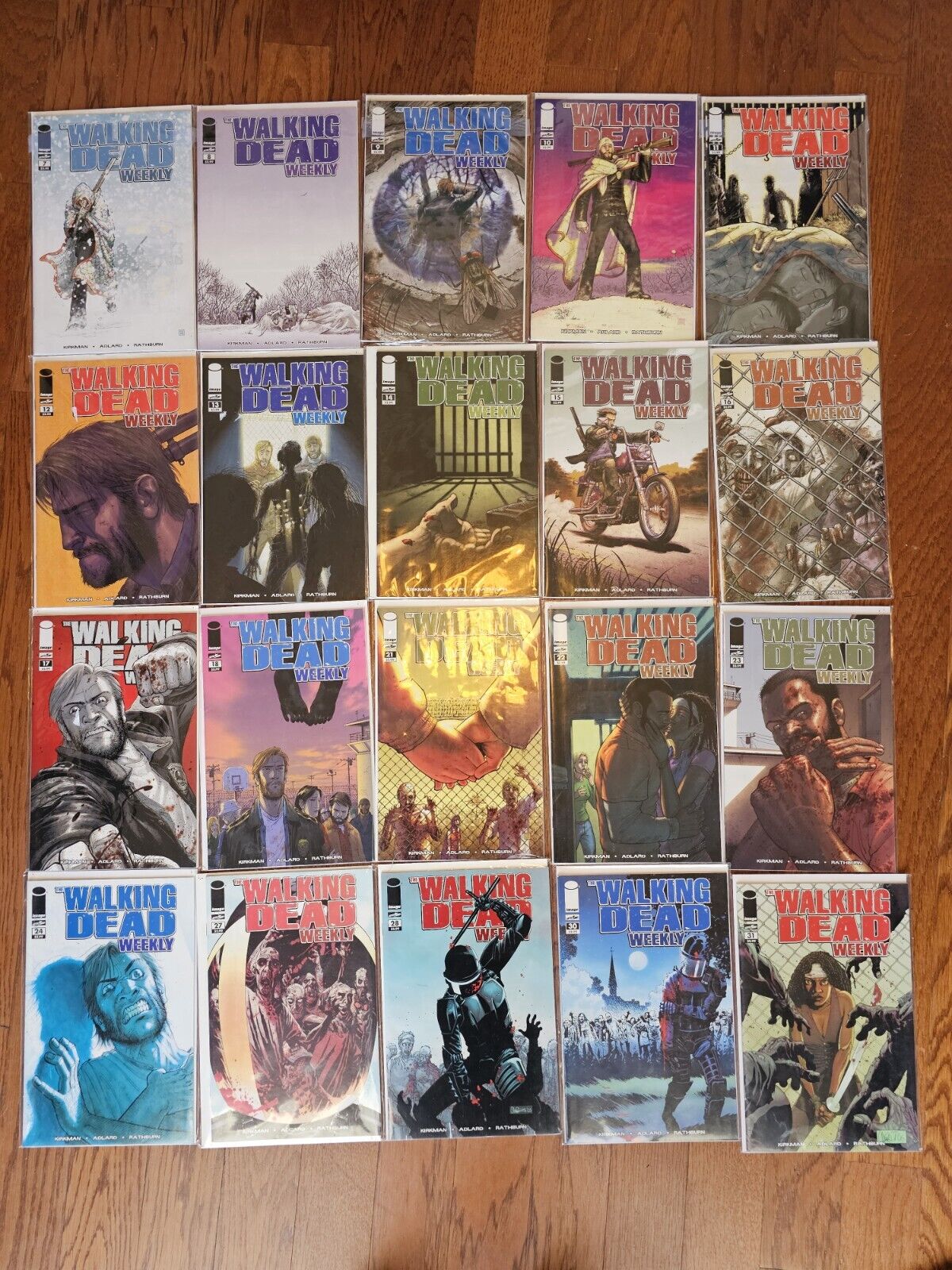 The Walking Dead Weekly #\'s 7-18, 21-24, 27, 28, 30, and 31. 20 books total. 