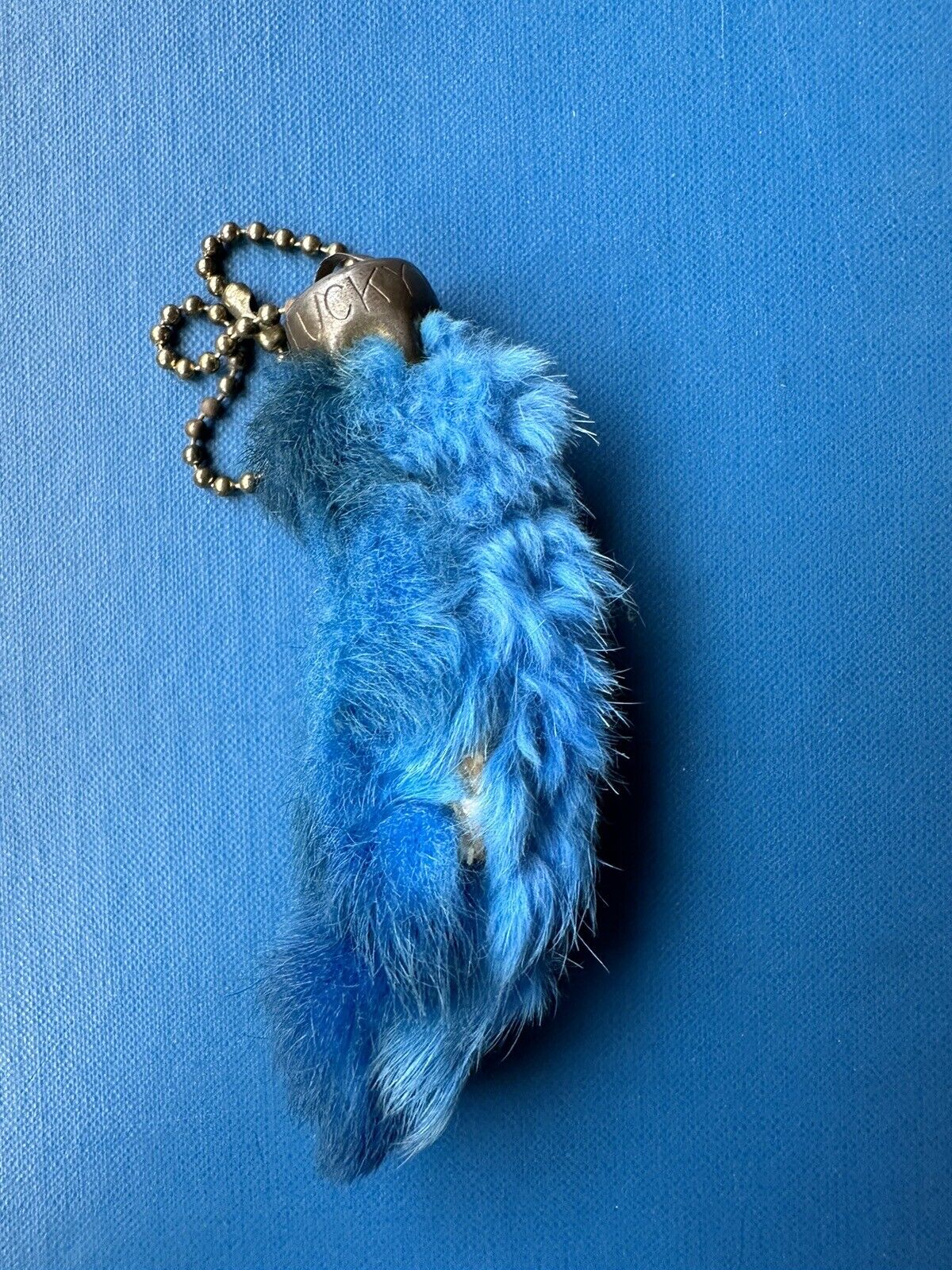 Vintage 1960s lucky charm U.S. blue rabbit foot keychain