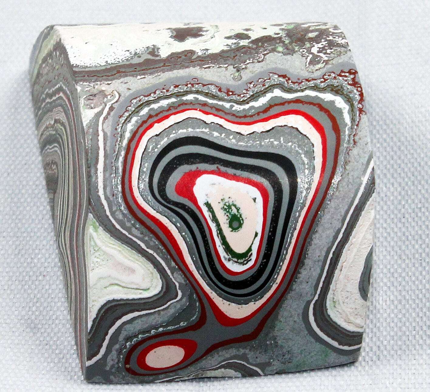 Finished Piece of Fordite - Premium Fordite - 33.86mm x 23.12mm x 15.75mm     (