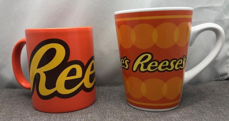 2 Reese’s Coffee Mugs  / Cups Orange Large and Small Logo