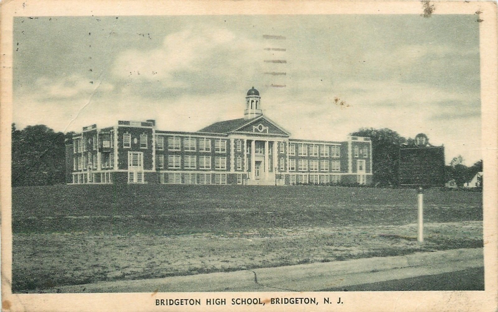 Bridgeton New Jersey~High School~Cupola~Columns~Sign in foreground~1935~Postcard