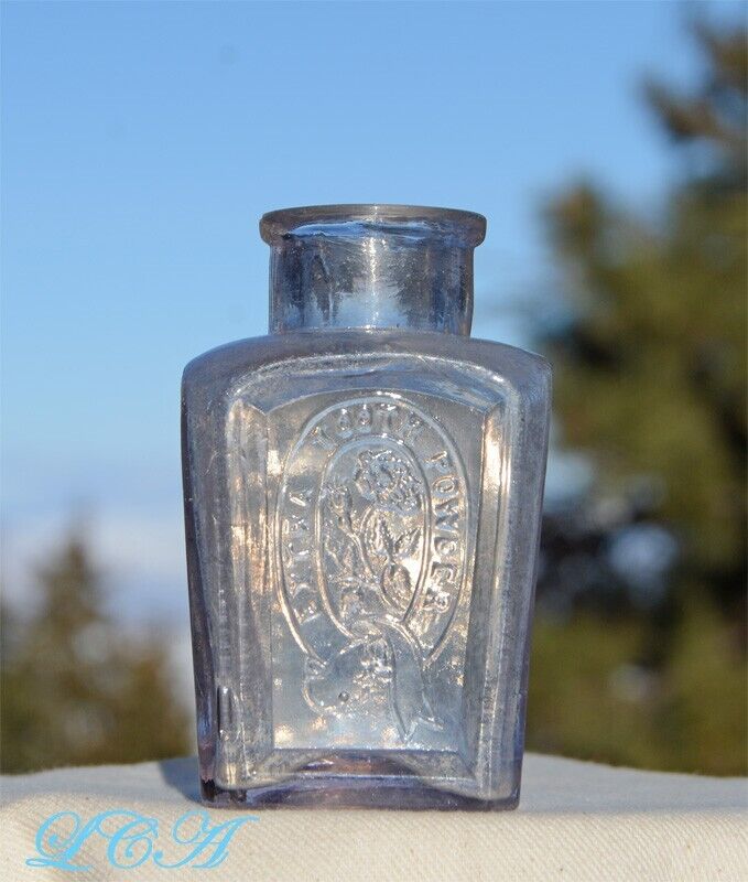 RARE antique Johnson & Lund EXTRA TOOTH POWDER fancy embossed bottle from 1880\'s