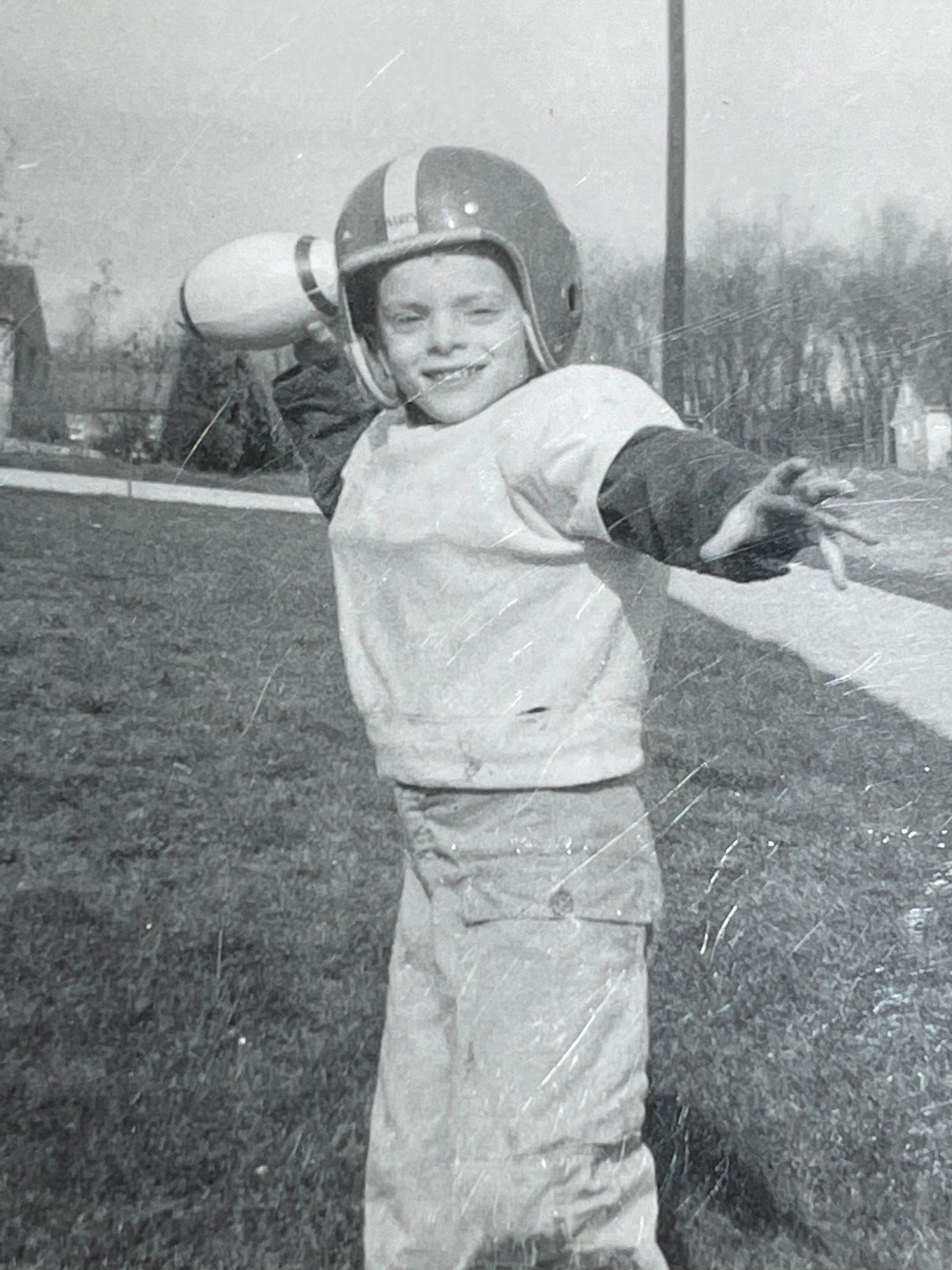 NF Photograph 1957 Boy Throwing Football Front Yard