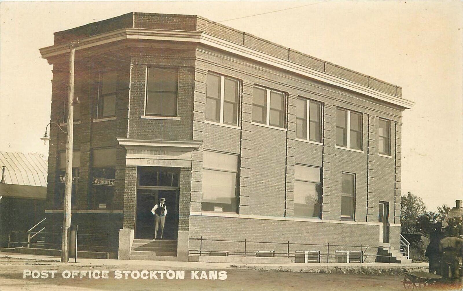 Postcard C-1910 RPPC Kansas Stockton Post Office occupation 23-11777