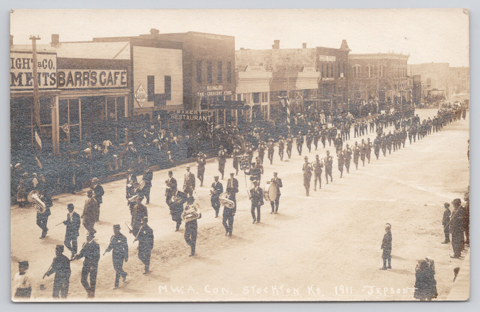 Stockton Kansas Parade WA Modern Woodmen Association Pre WWI Soldiers Real Photo