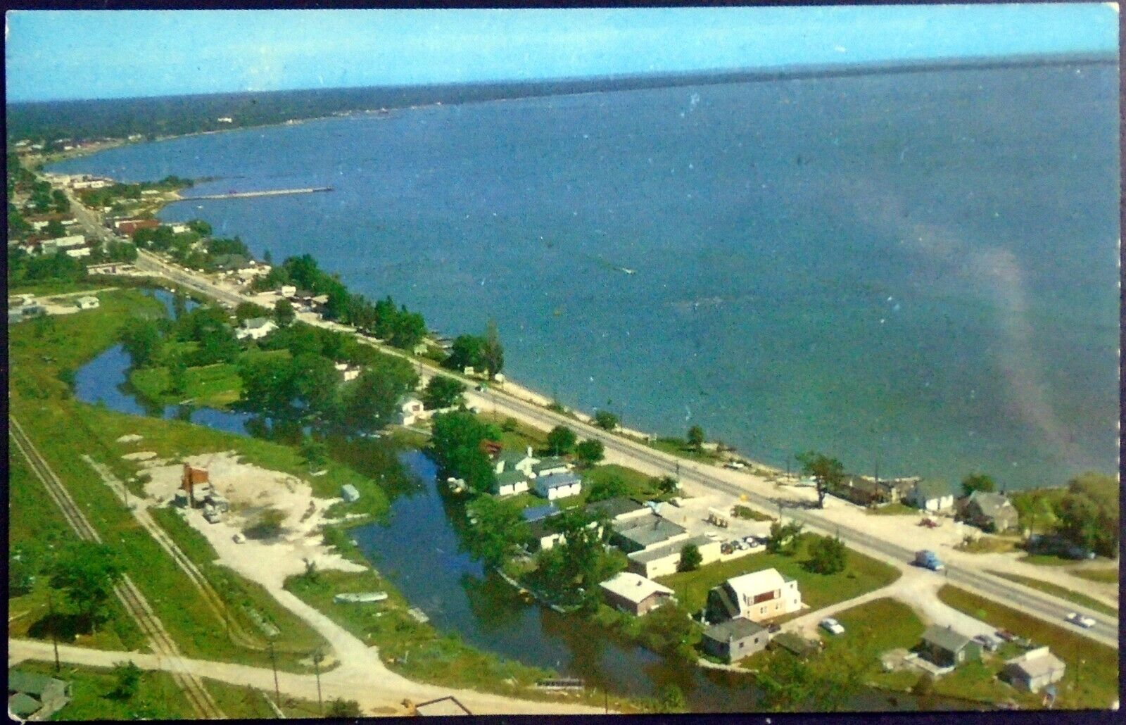 1961 Aerial View of U.S. 23 Scenic Highway and Tawas Bay, Michigan.