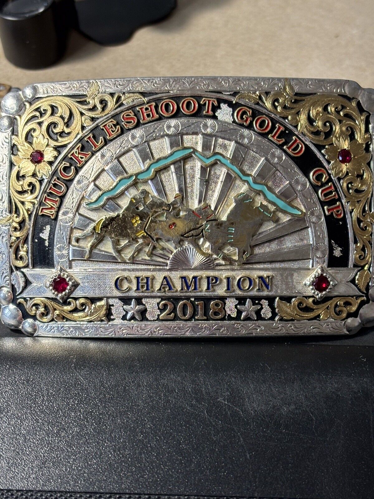AUTHENTIC  2018 MUCKLESHOOT GOLD CUP CHAMPION BELT BUCKLE WITH RUBY GEMSTONES