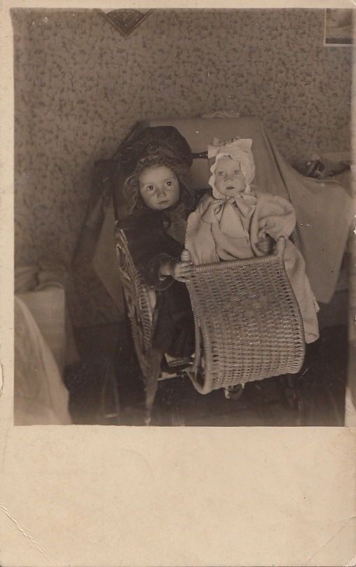 RPPC Postcard Two Little Girls Bonnets Wicker Carriage