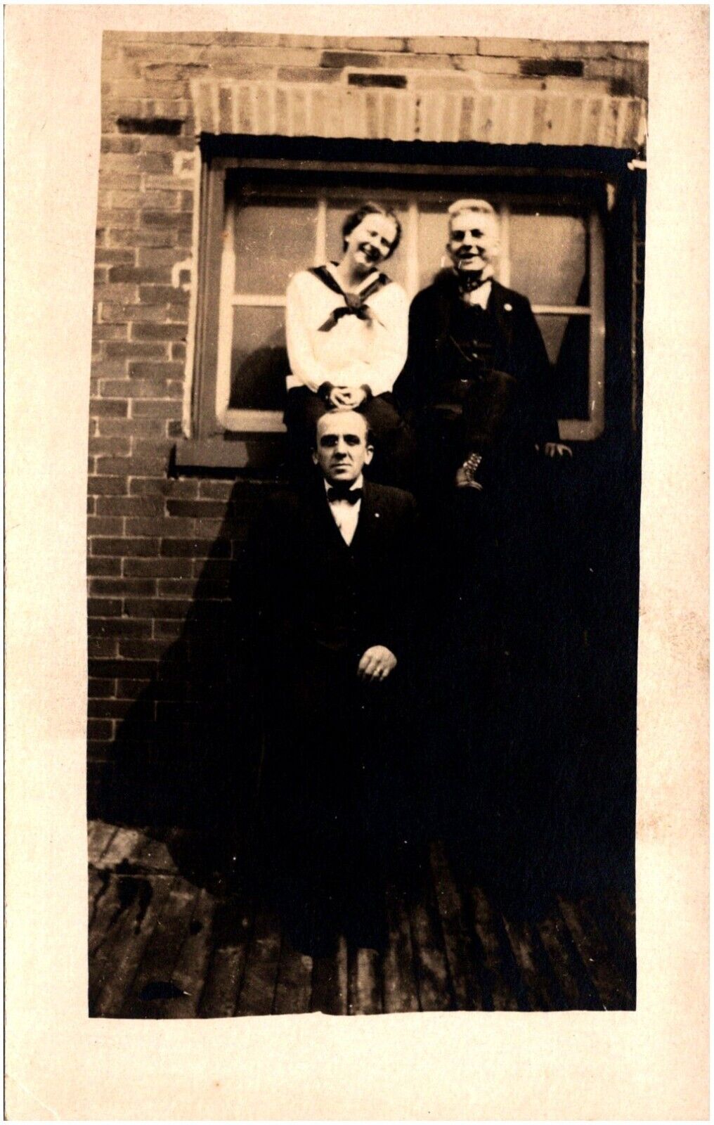 Laughing Friends Sitting on Windowsill Butch Woman? 1920s RPPC Postcard