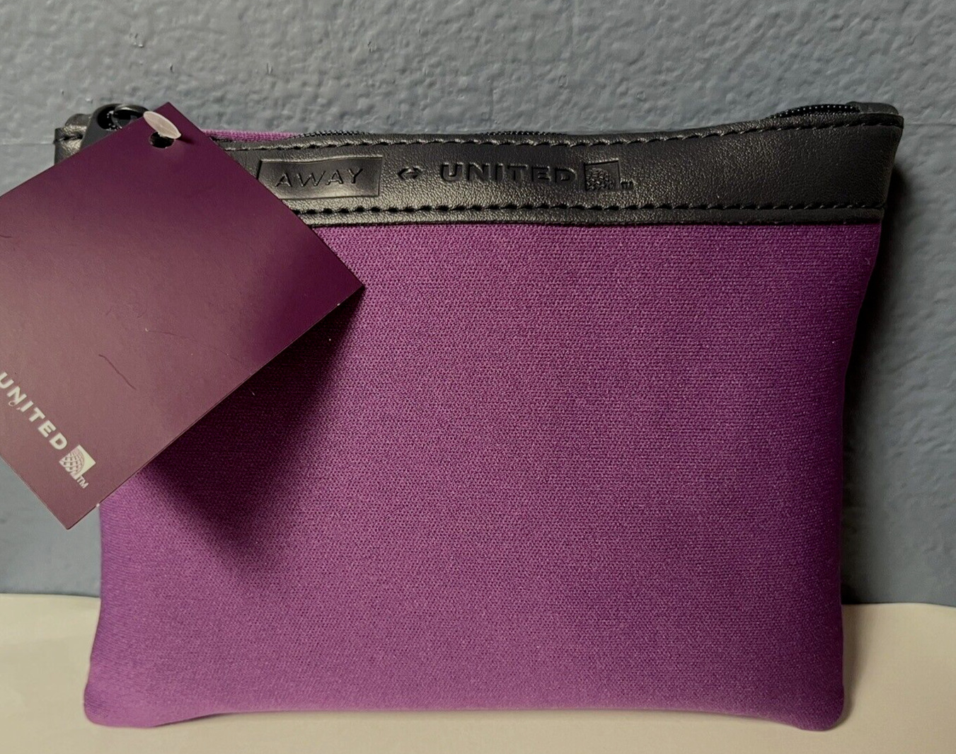 UNITED AIRLINES AWAY SUNDAY RILEY Business First Purple Neoprene Amenity Kit Bag