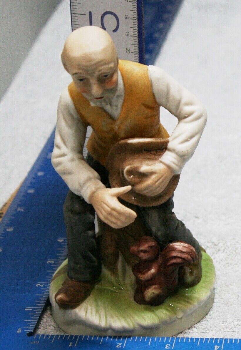 Vintage Porcelain Bisque Figurine Old Man Sitting on Stump with a Squirrel Near