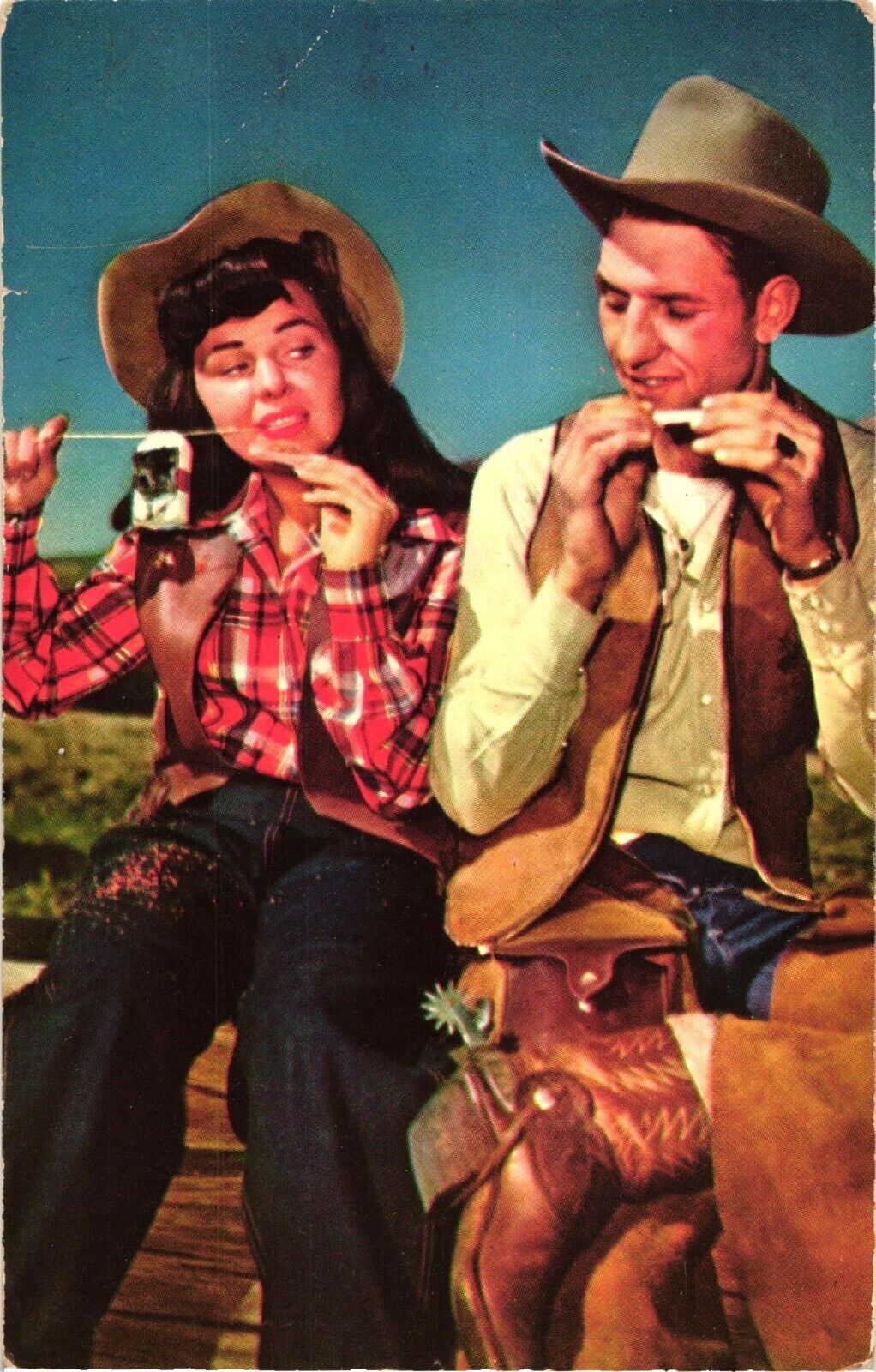 Cowgirl Cowboy Rolling a Cigarette Ride Em and Roll Em Postcard 1950s Boot Spurs
