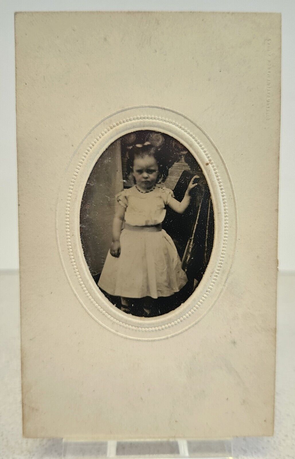 Antique CDV Hand Tinted Photo LITTLE GIRL WITH ROSEY CHEEKS Oval Matting