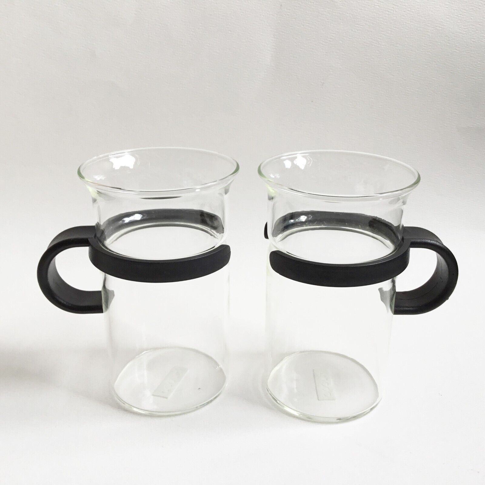 Bodum Tall Bistro Nouveau Glass Mugs Cups Black Curved Plastic Handle Set of 2