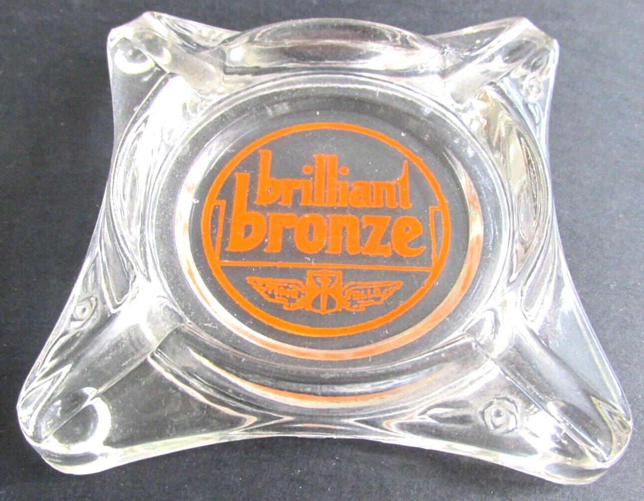 Vintage JOHNSON OIL Brilliant Bronze Advertising Glass Ashtray Time Tells Pyro A