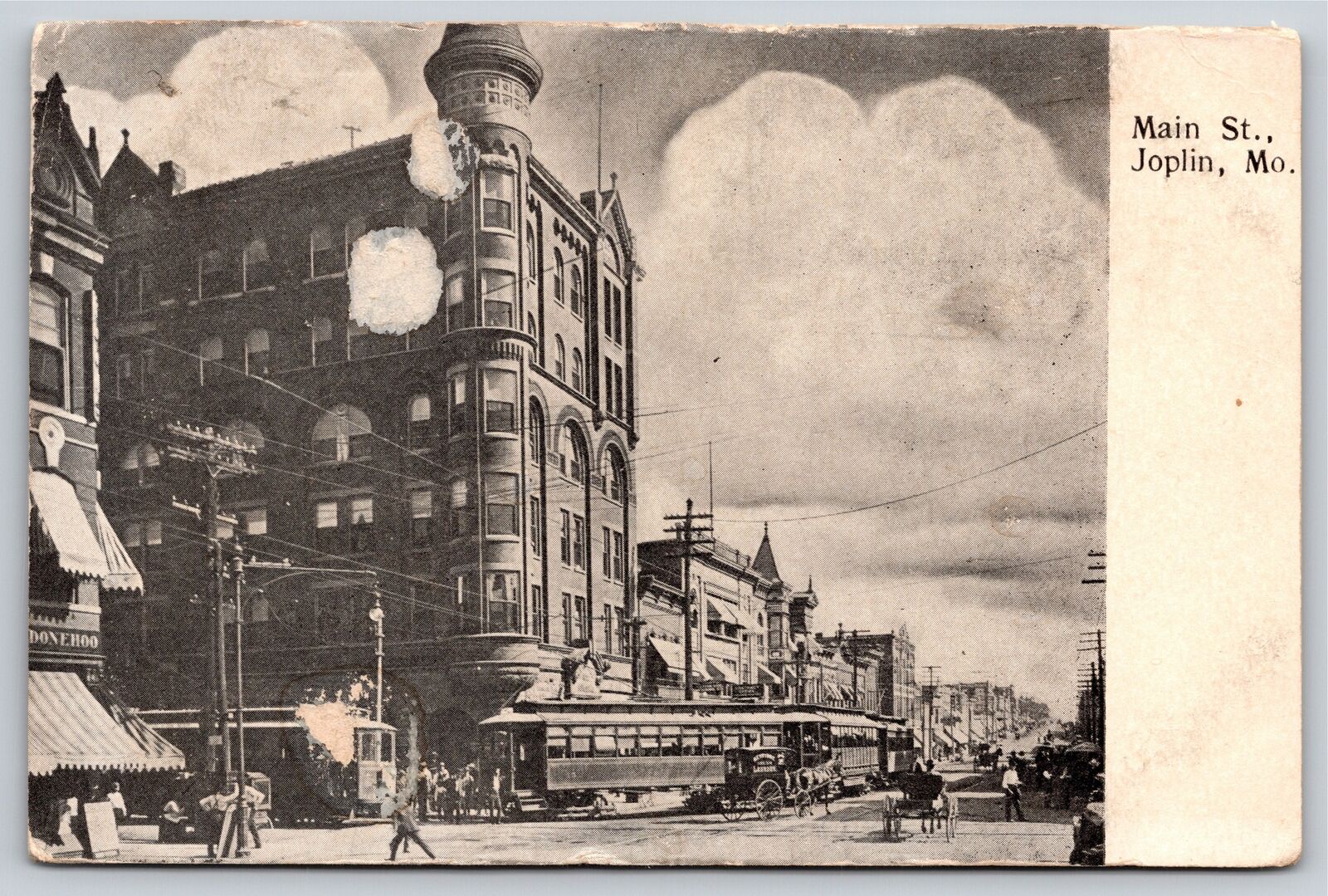 Main Street~Joplin Missouri~Trolleys & Horse Carriages~B&W~Vintage Postcard