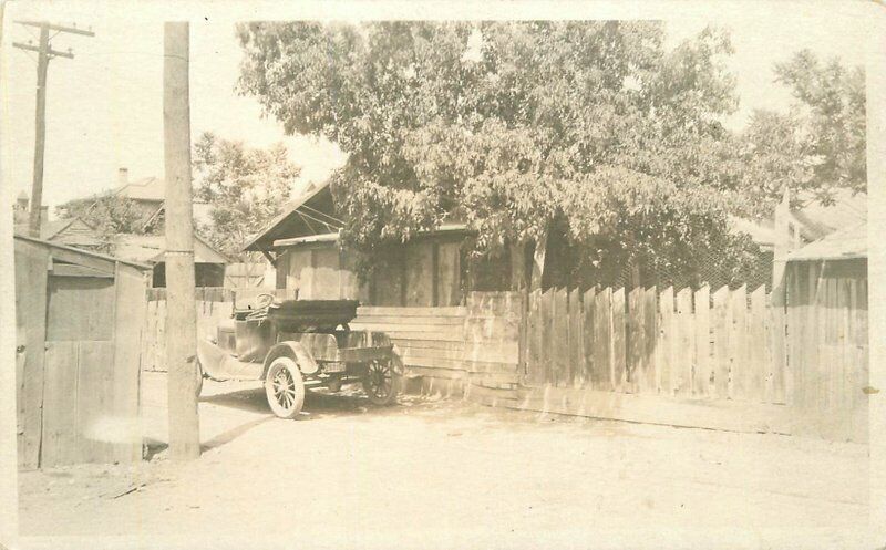C-1910 Early Auto roadster Alley Home RPPC Photo Postcard residence 21-9617