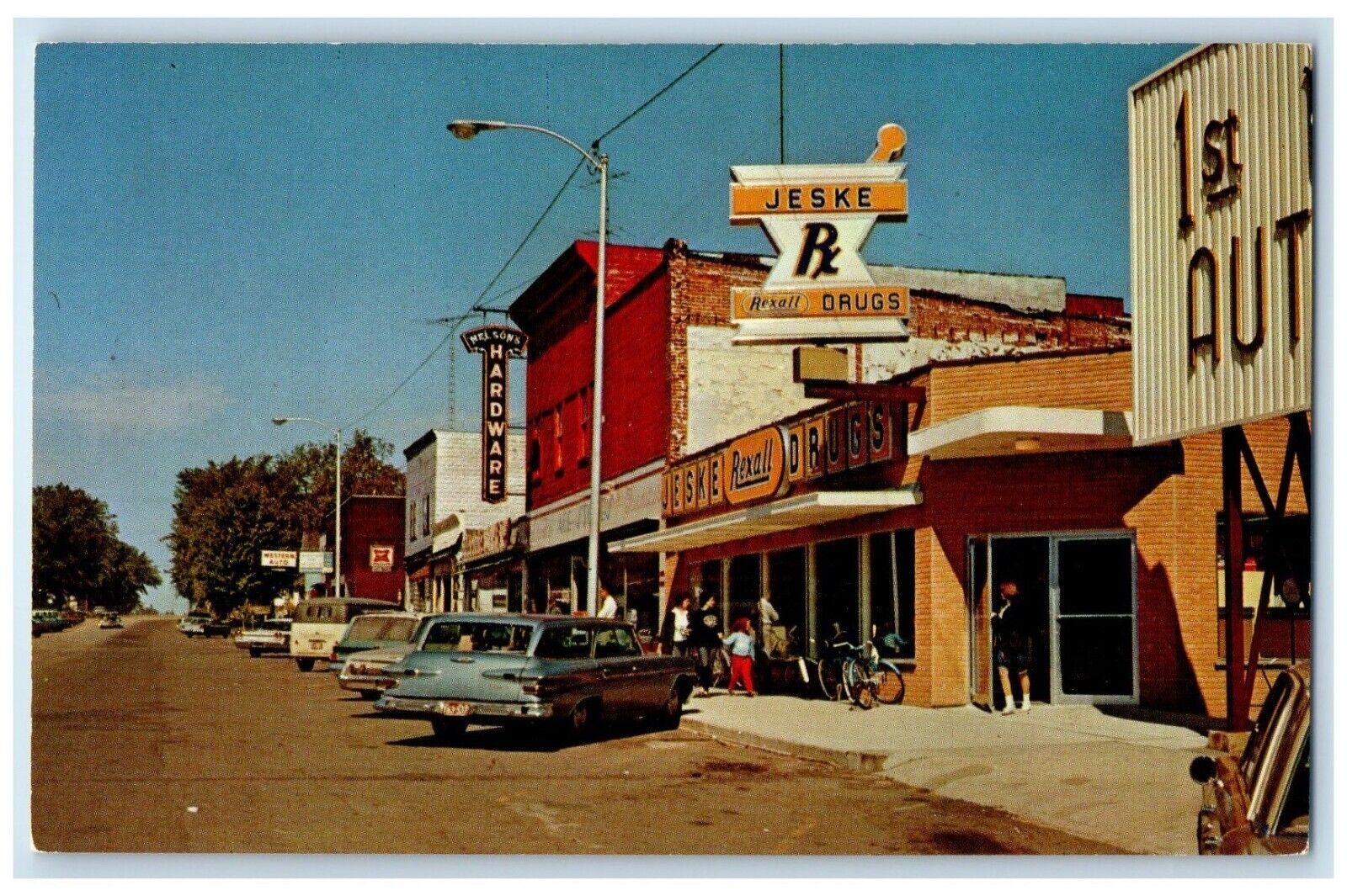 1960 Busy Day Buildings Store Classic Cars Park Falls Wisconsin Antique Postcard