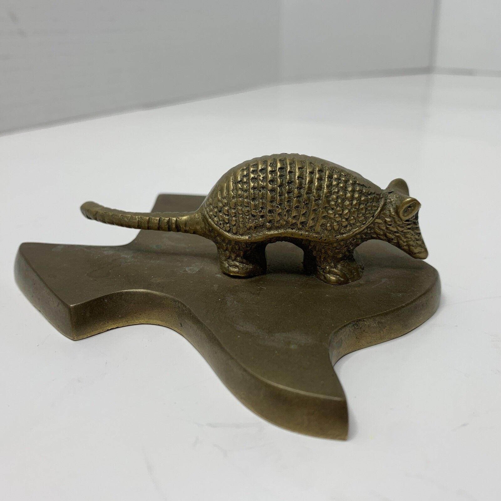 Vintage Russ Brass Armadillo Figurine Standing on the State of Texas with Patina