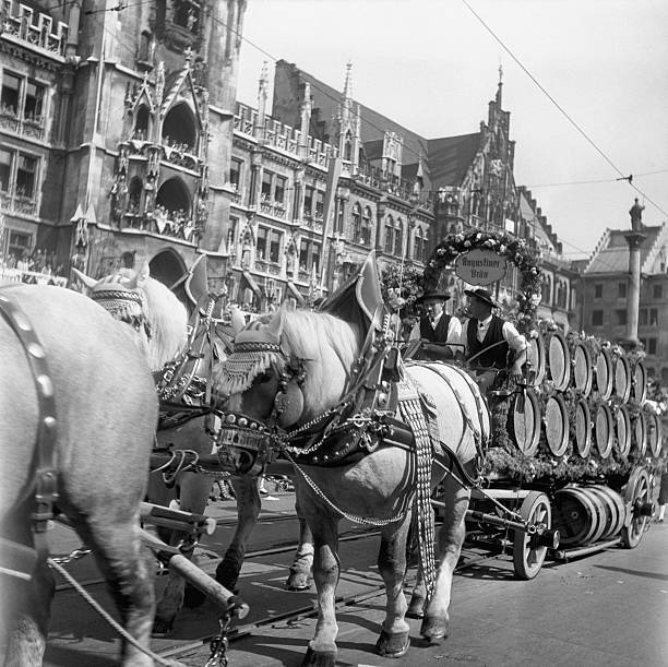 An Augustiner Brau cart loaded casks beer crossing Marienplatz dur- Old Photo