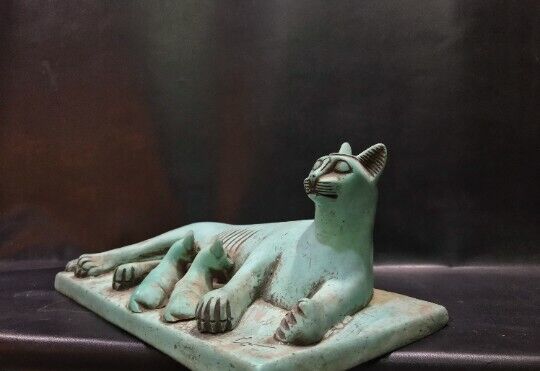 In a perfect scene Egyptian Cat Bastet goddess of protection Feeding Her sons