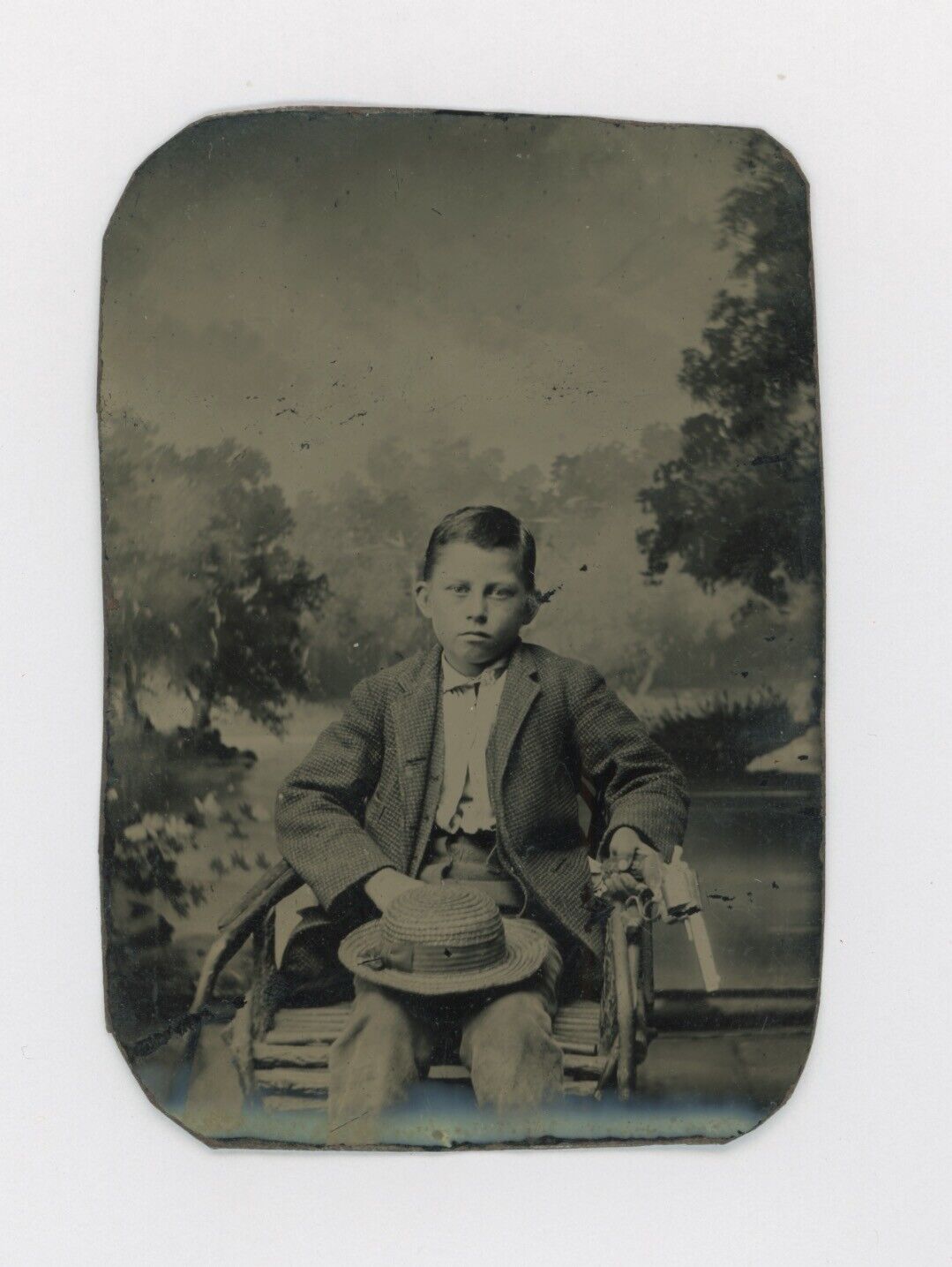Ca. 1870\'s-1880\'s TINTYPE SERIOUS LOOKING BOY HOLDING A REAL SIX GUN PISTOL