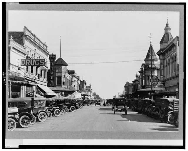 Main Street in Merced,California,CA,Merced County,1900-1920,Automobiles,Stores