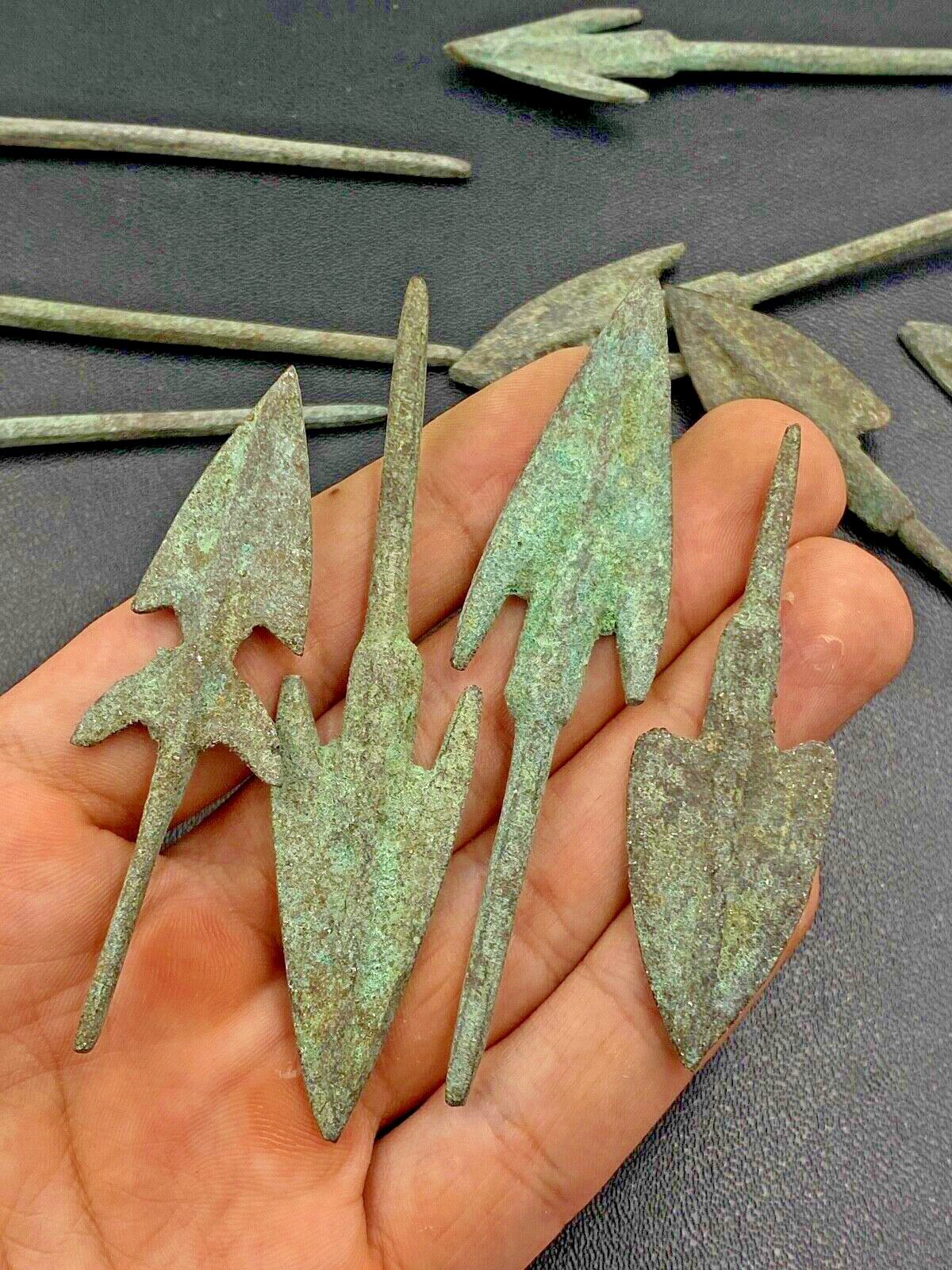 Collection of 12  bronze arrows and spear points, Roman and later (14)