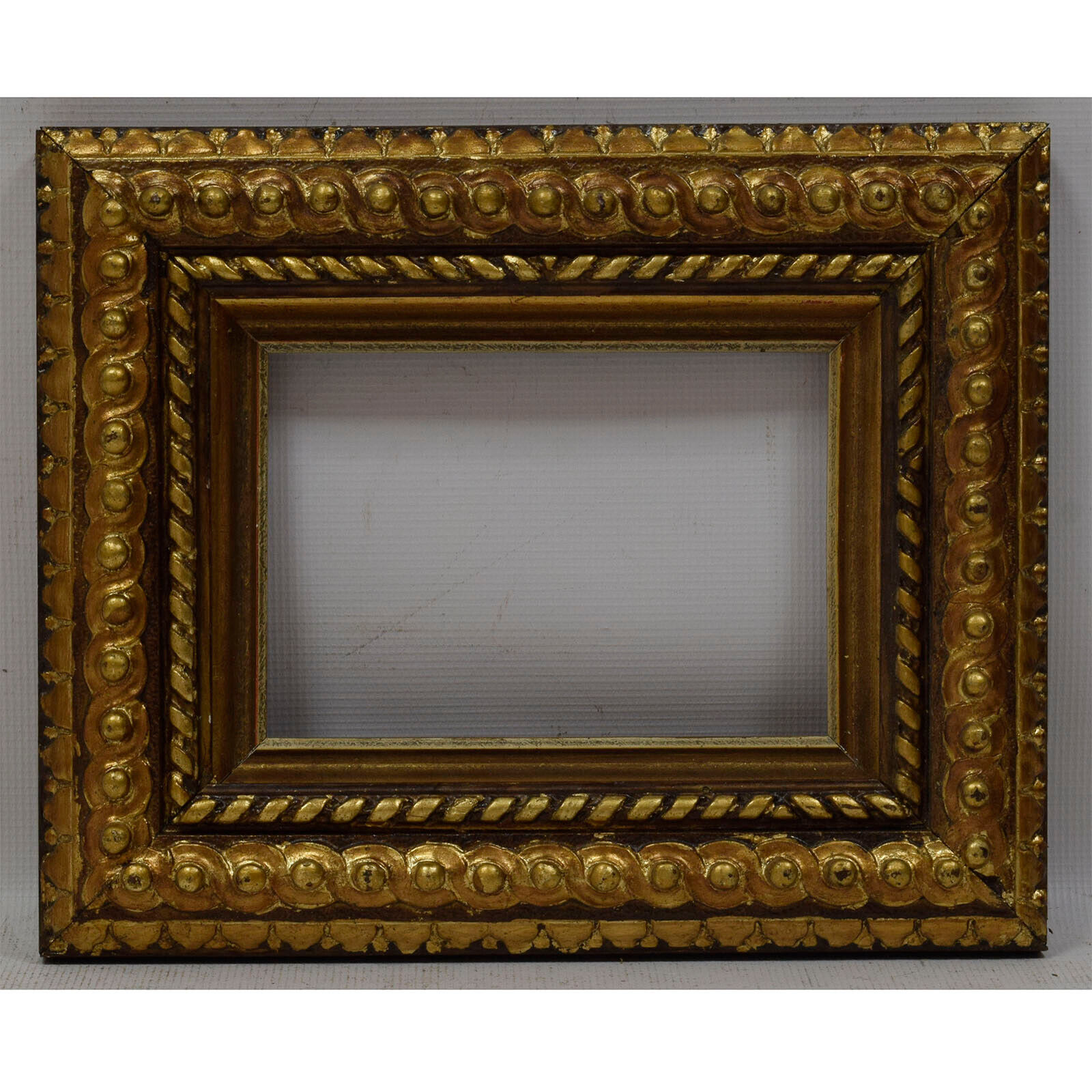 Ca. 1900 Old wooden frame decorative with metal leaf Internal: 8.6x6.1 in