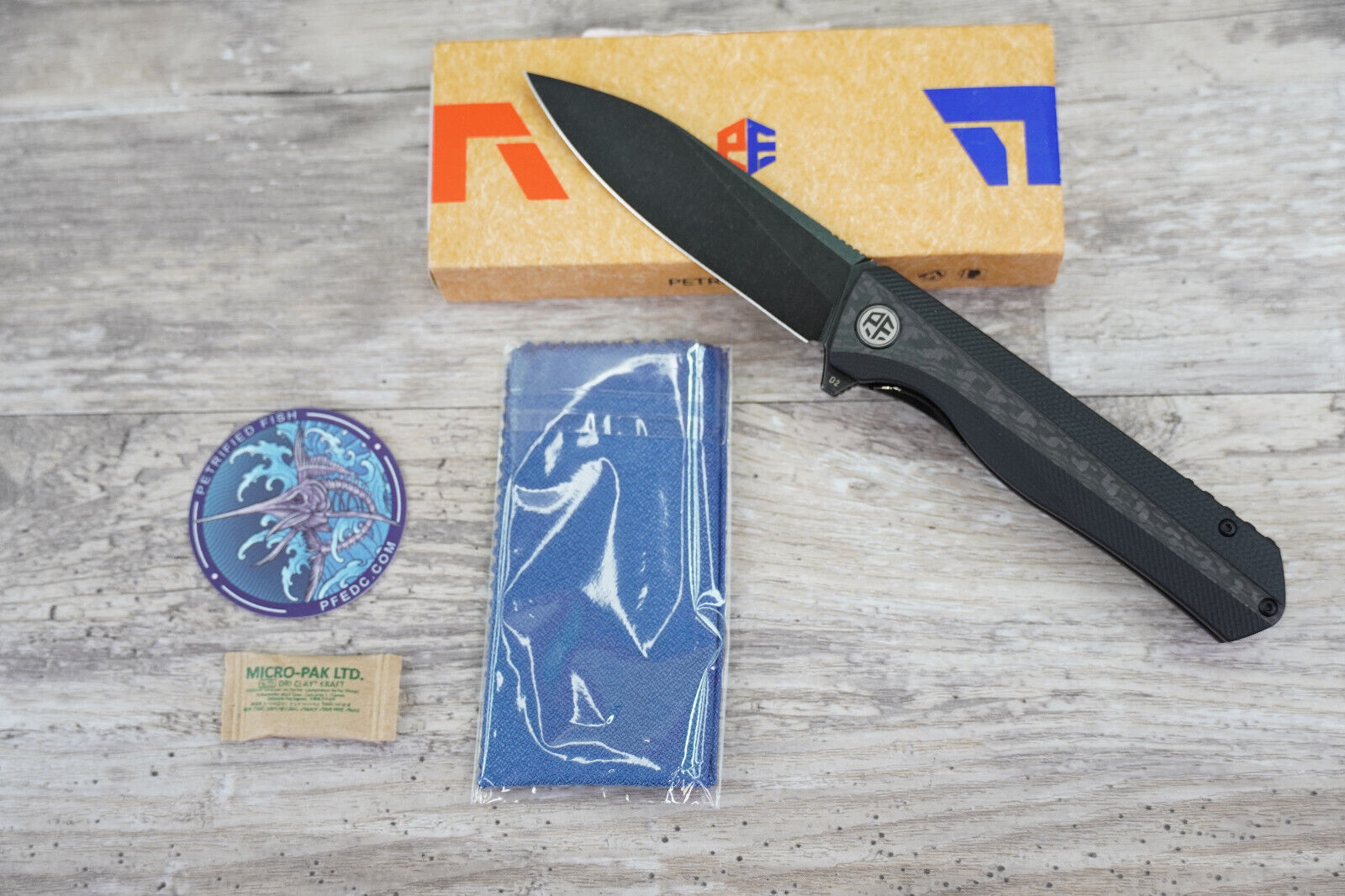 Petrified Fish 818 Black CF/G10 Handle Black Stone Washed D2 Folding Blade Knife