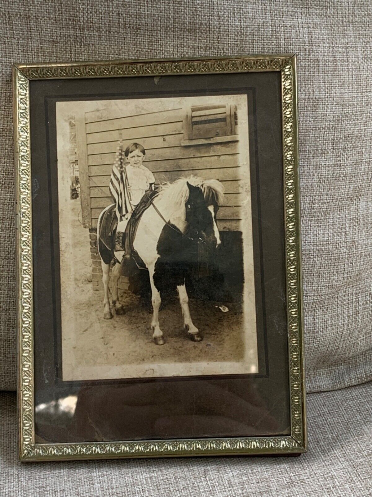 Old Vintage  Picture Boy on a pony holding flag