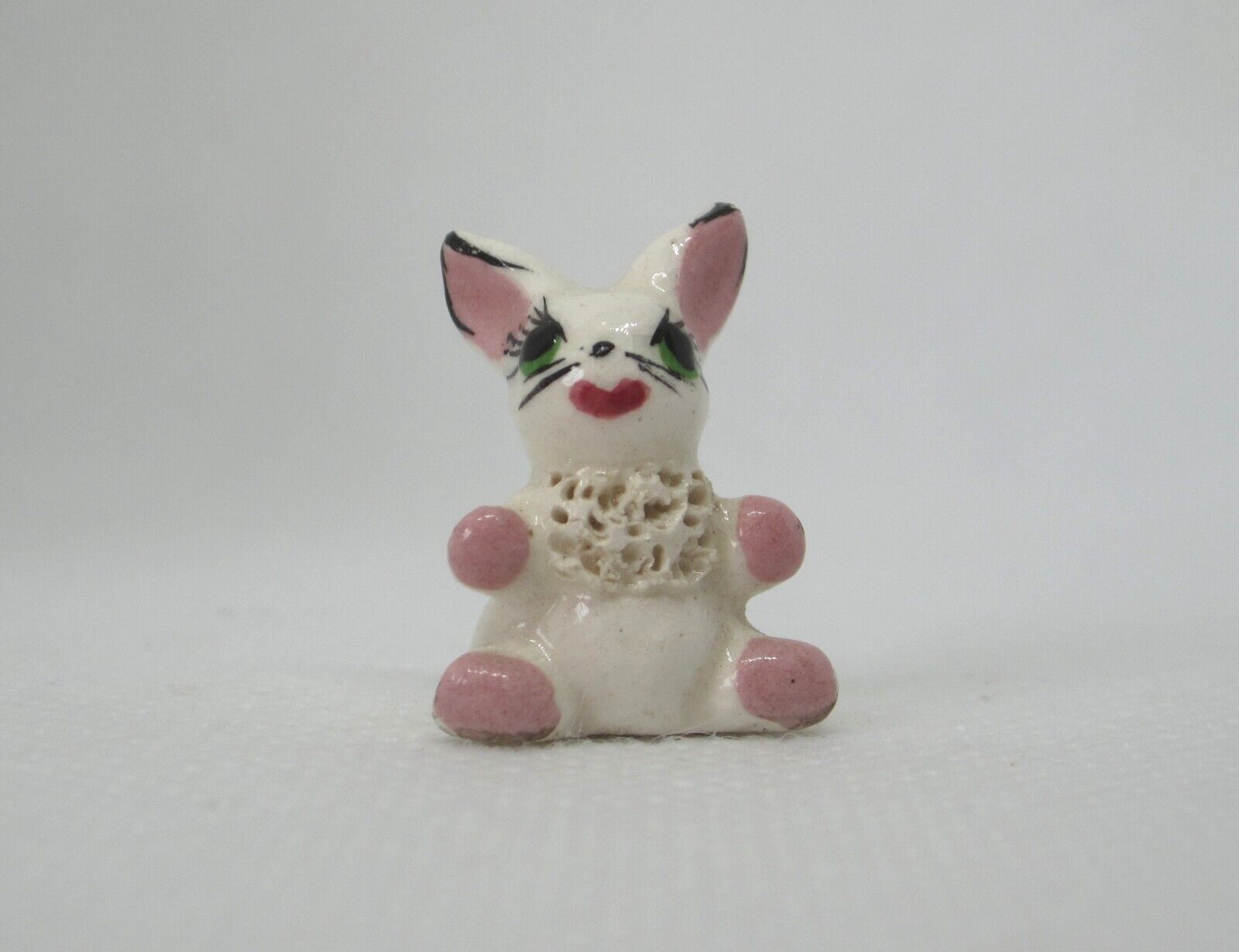 White bunny rabbit miniature figurine with eyelashes