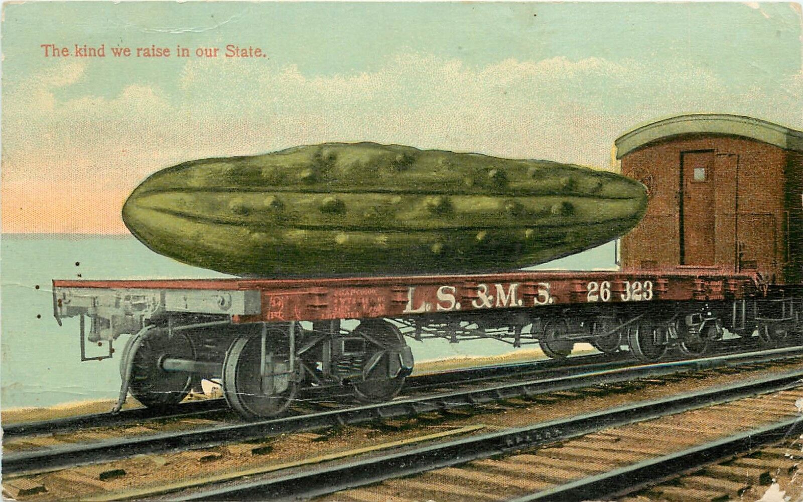 c1915 Postcard Exaggeration Huge Cucumber on L.S.& M.S. RR Flatcar Agriculture