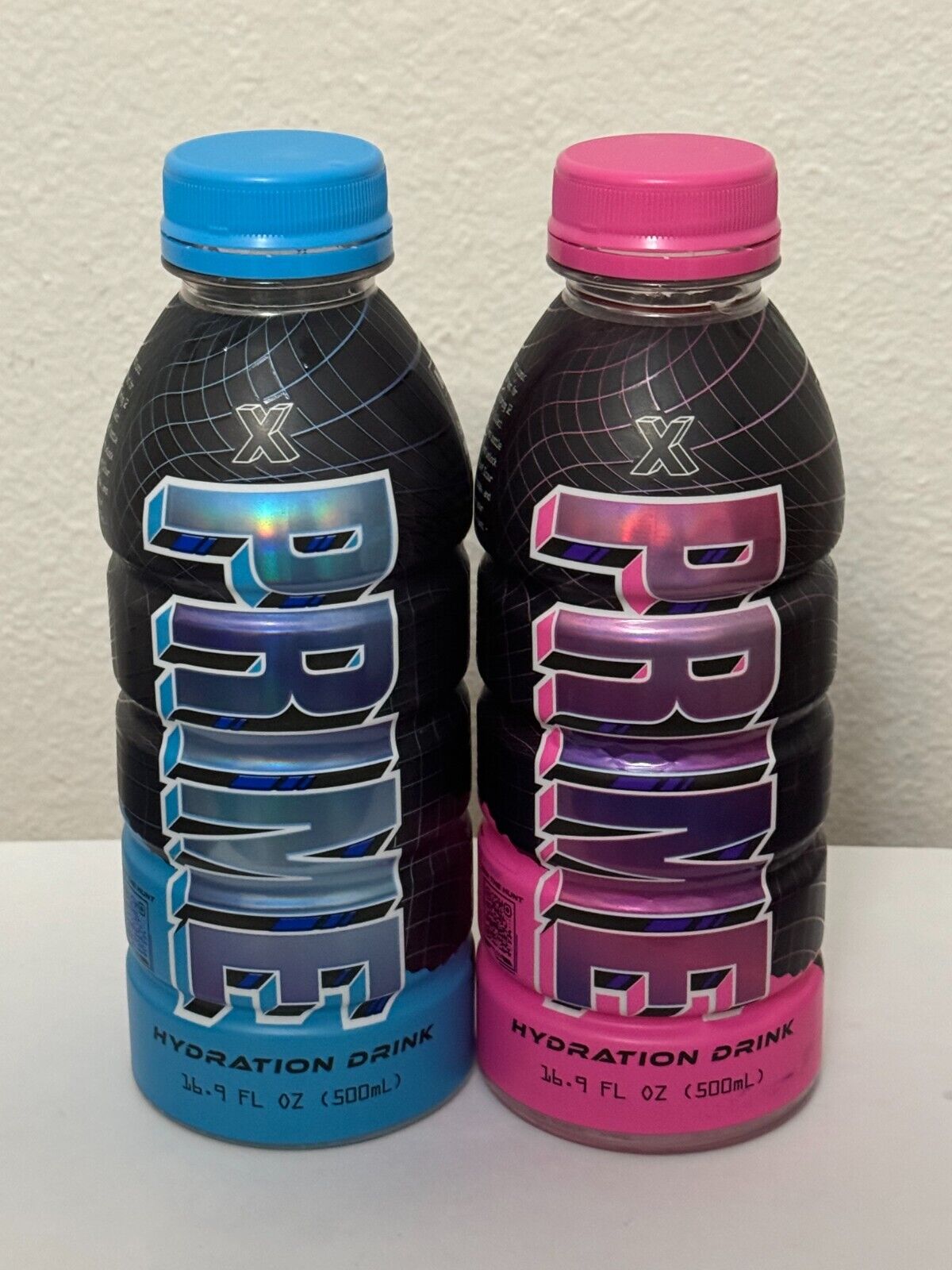 Prime X Hydration Drink Pink+Blue Holograph   Opened- 1 Pink + 1 Blue