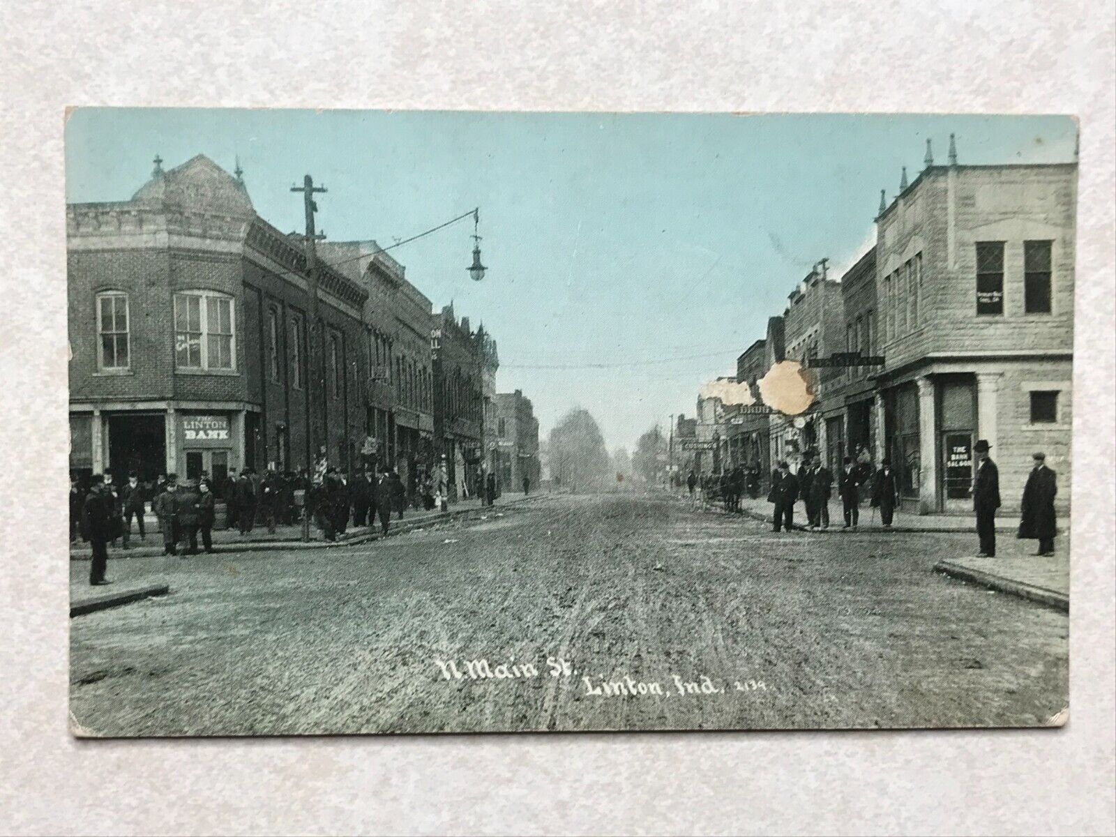 F1277 Postcard N Main Street St scene Linton IN Indiana -damage to front