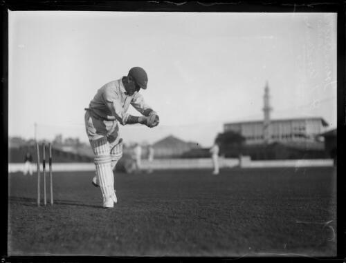T Andrews catching a cricket ball next to the wickets, NSW, ca 1930 Old Photo