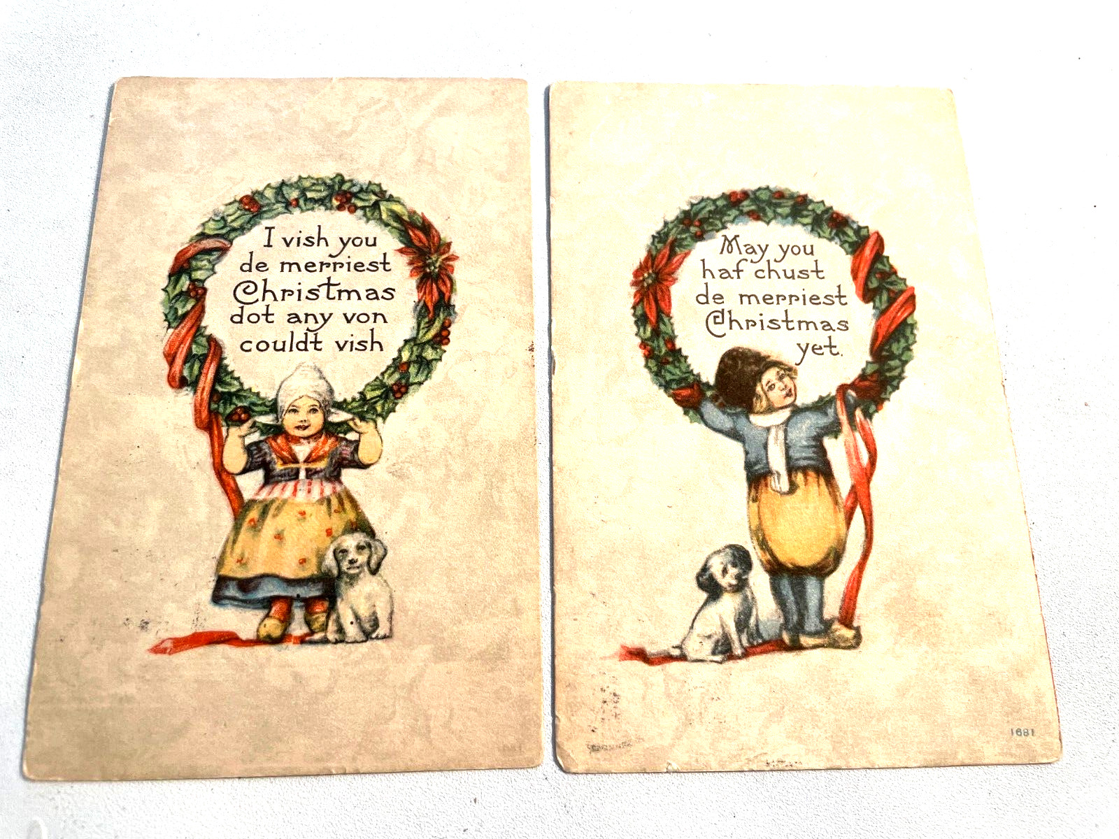 Christmas Set of Two \'Dutch\' Children with Dogs and Wreaths Postcards, 1915