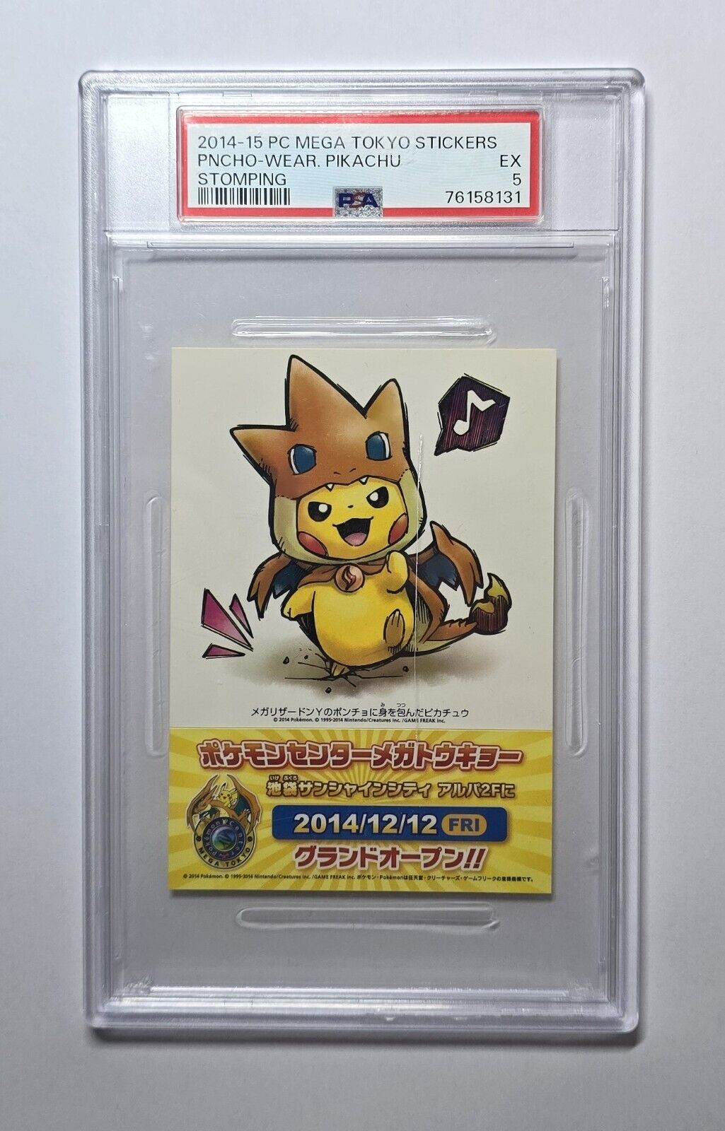 2014 Pokemon Center Mega Tokyo Pikachu Poncho PSA 5 (Damaged Slab)