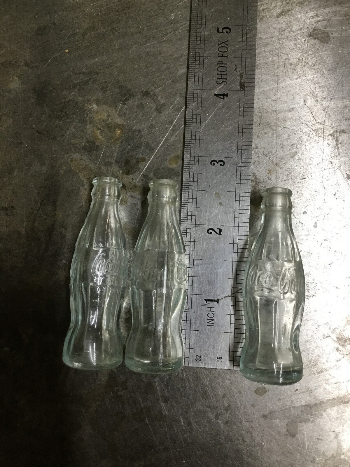 Miniature glass Coke bottles
