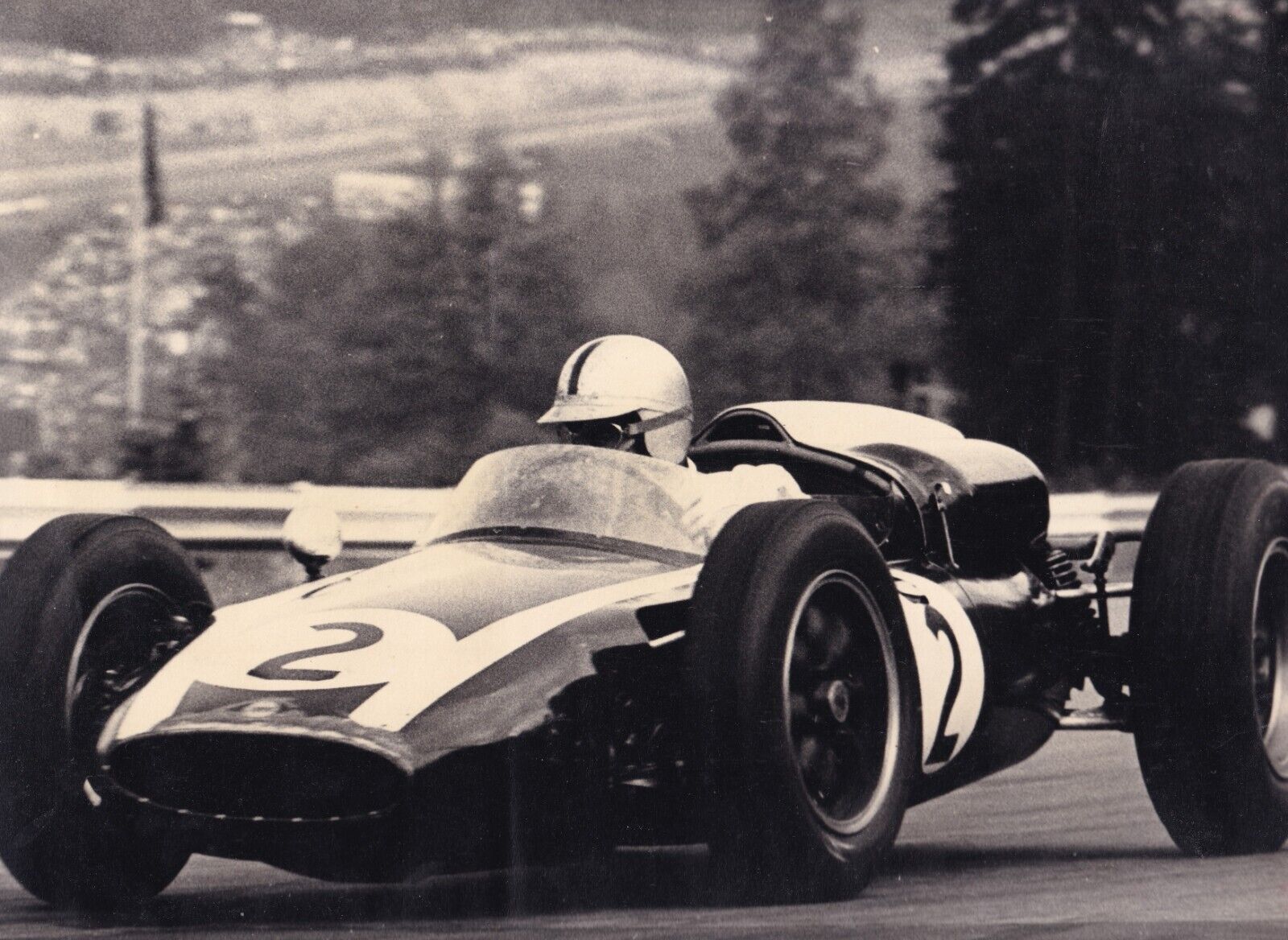 COOPER CLIMAX DRIVEN BY JACK BRABHAM, GOODWOOD 1957 PHOTOGRAPH.