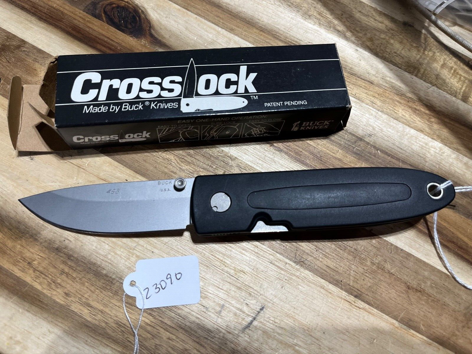 Rare Buck Crosslock knife engravings on blade (23090)