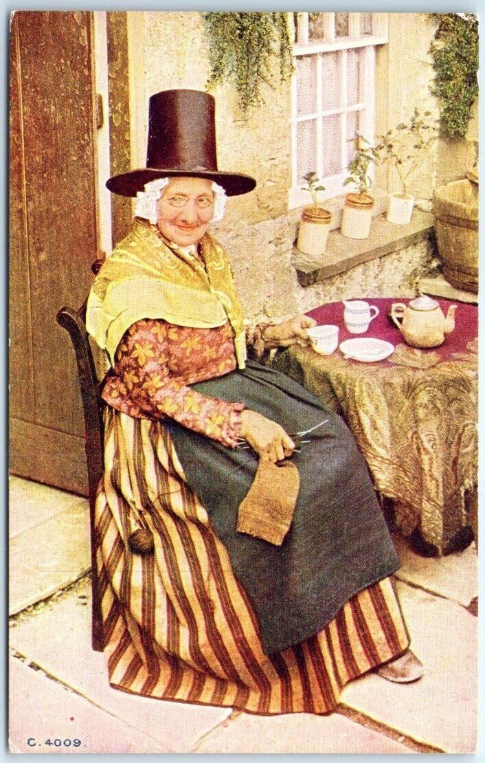 Postcard - Old Woman Having Some Tea Print