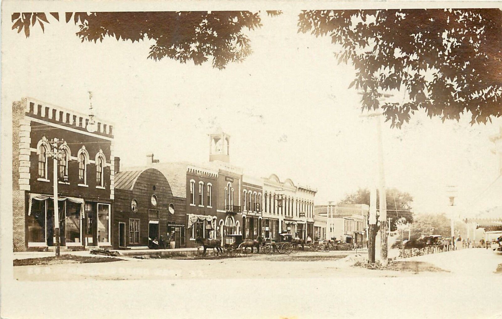c1910 RPPC Postcard Street Scene Amboy IL Horsedrawn City Hall Bank Lee County 