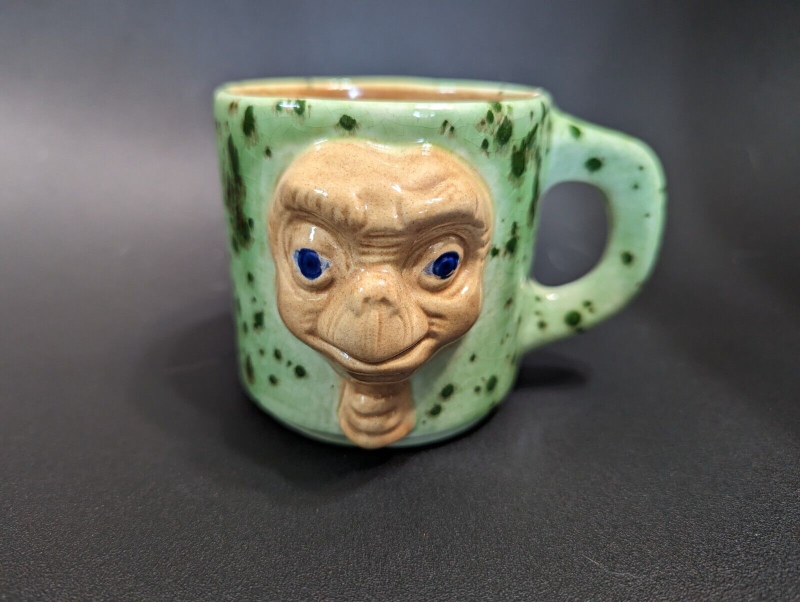 Vintage ceramic green speckeled E.T. mug